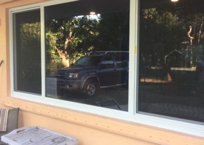 Caki wall of a house in florida keys with impact windows